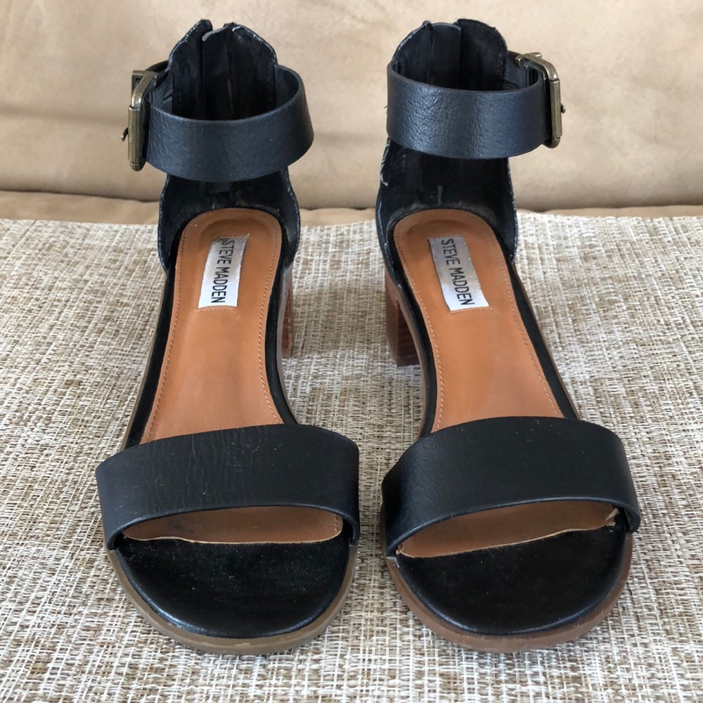 Black Steve Madden sandals.